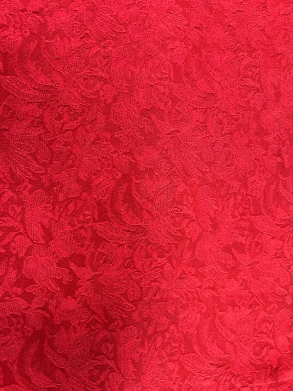 Crate&Barrel Madiera Tablecloth in Garnet Red, 70x120”. Jacquard pattern.